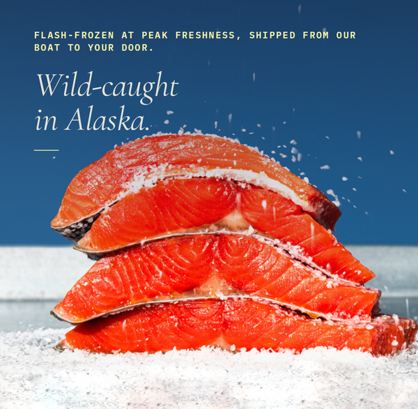Stack of wild-caught salmon fillets with text about freshness and origin