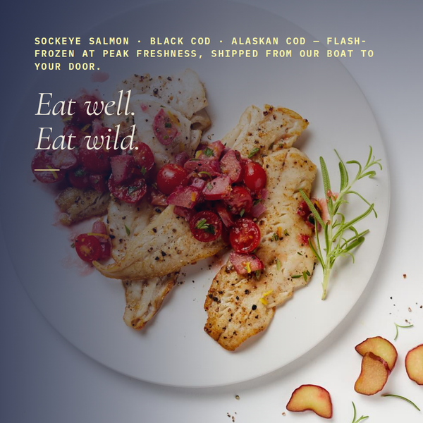 Promotional banner showing the headline Eat well. Eat wild. over a plate of cooked Alaskan white fish fillets with cherry tomato relish and rosemary