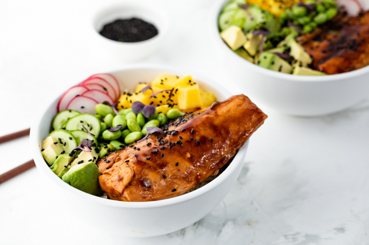 Alaskan sockeye salmon bowl with glazed fillet, avocado, edamame, cucumber, radish and mango cubes