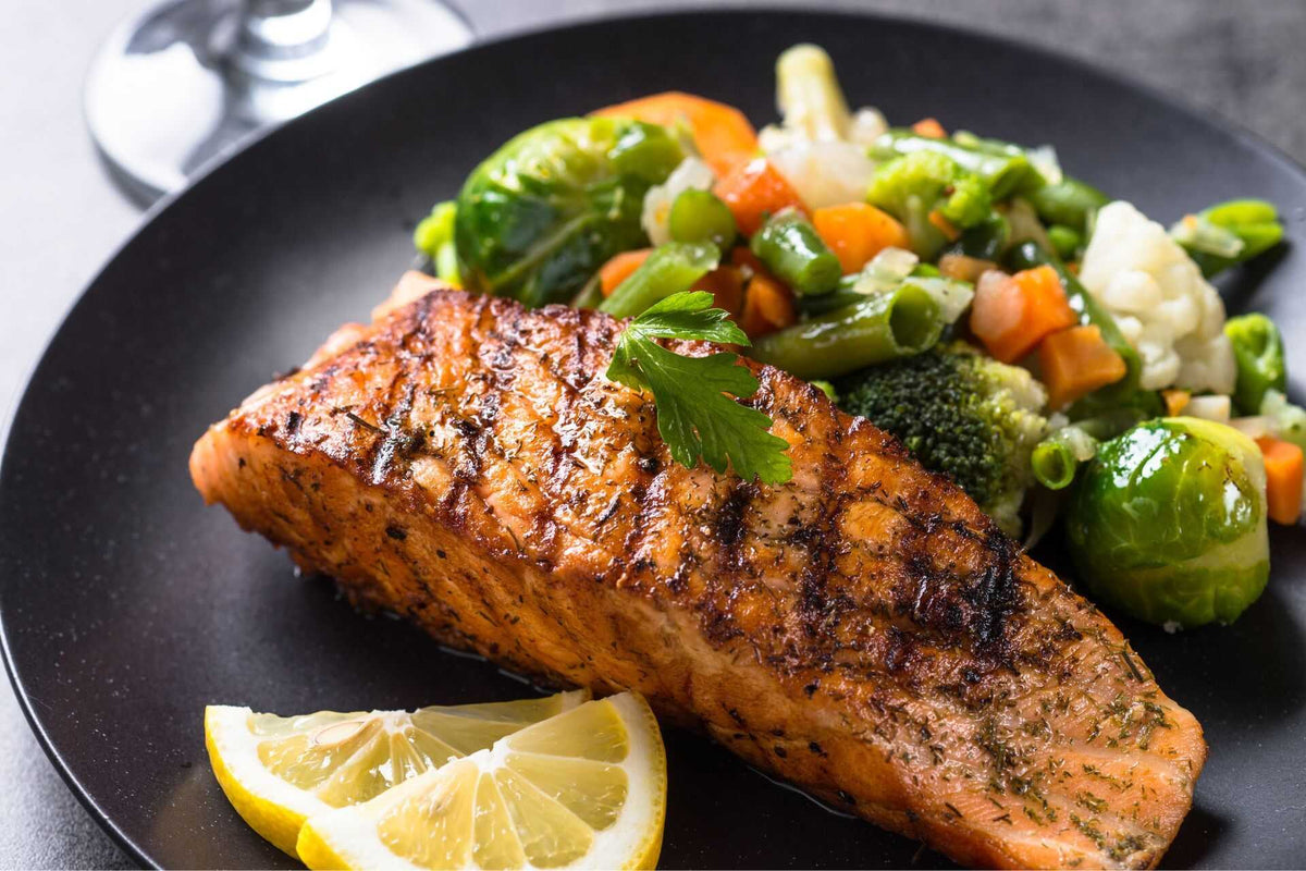 Pan Seared Salmon and Vegetables on a Dinner Plate