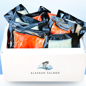 White box of vacuum-sealed wild sockeye salmon portions with ALASKAN SALMON logo